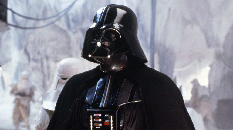 Darth Vader cuts an imposing figure, his black armor contrasting those he commands.