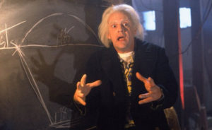 He was going to explain time travel, but he's still shocked about that Voldemort face.